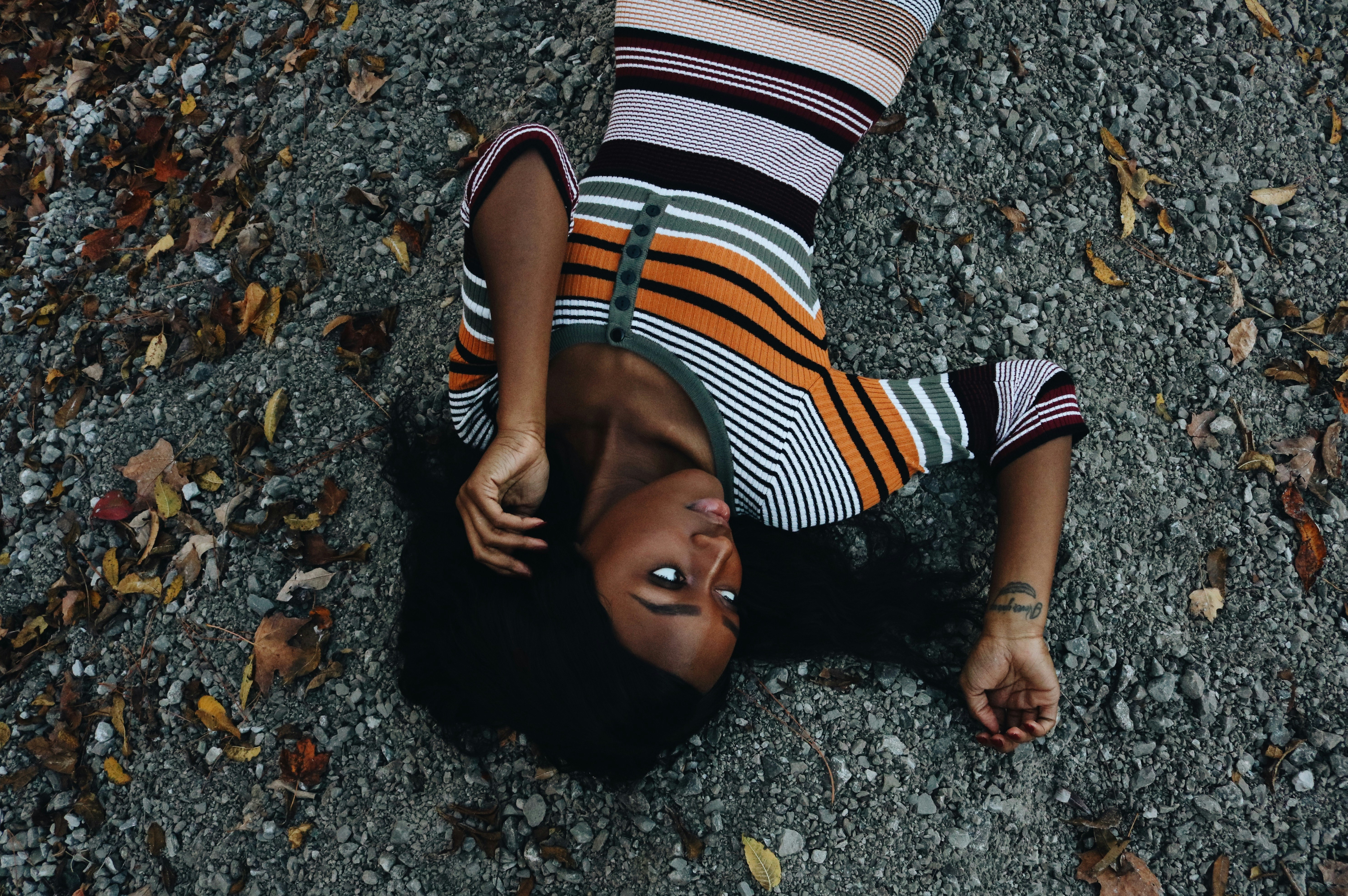 woman lying on sand